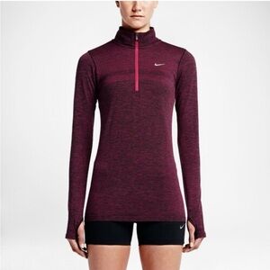 Nike Women's Dri-FIT Element 1/2-Zip running top in a purple/pink